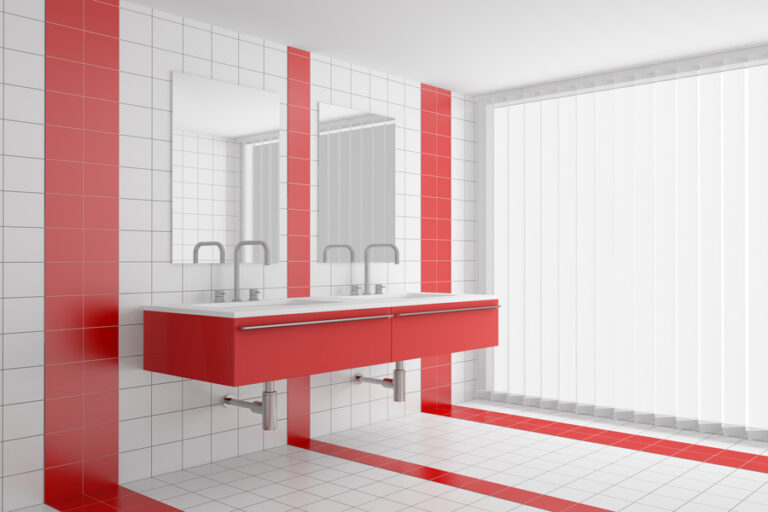 Une salle de bain en carreau modernisé avec quelques motifs de tomettes rouges